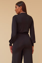 DYNASTY LONG SLEEVE SURPLICE JUMPSUIT WITH MATCHING BELT - BLACK